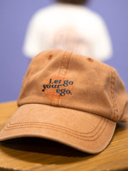 Let go your ego casquette orange brûlé